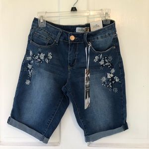 Never worn! Mid rise shorts! size 4!